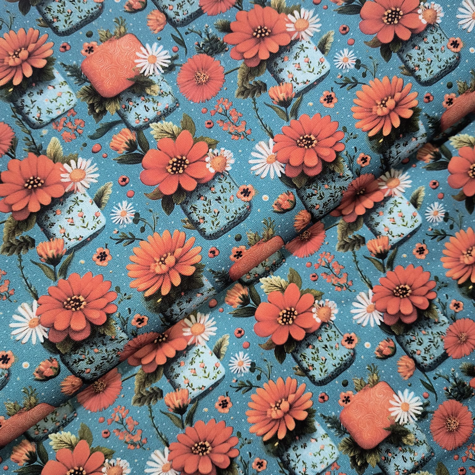 Tecido Tricoline Digital Margaridas Laranjadas e Brancas fd Azul